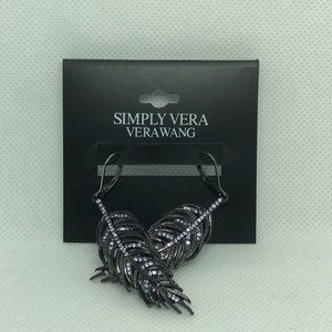 Feather earrings by Vera Wang